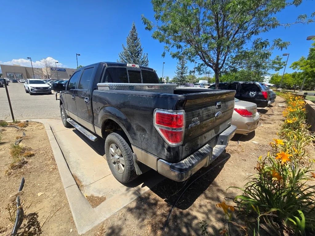 Used 2011 Tuxedo Black Metallic Ford XLT image 13