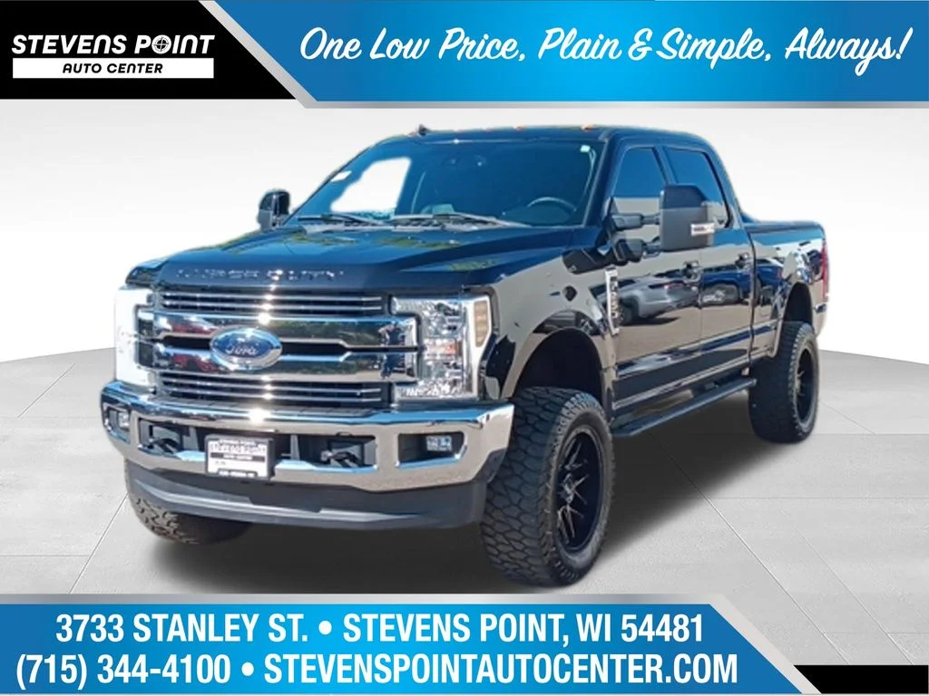 Used 2019 Black Metallic Ford Lariat image 1