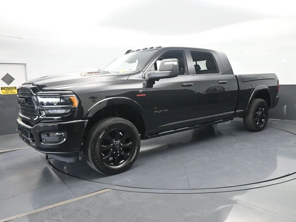 Used 2023 Diamond Black Crystal Pearlcoat Ram Limited image 1