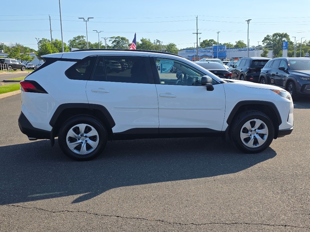 Used 2021 Super White Toyota LE image 14