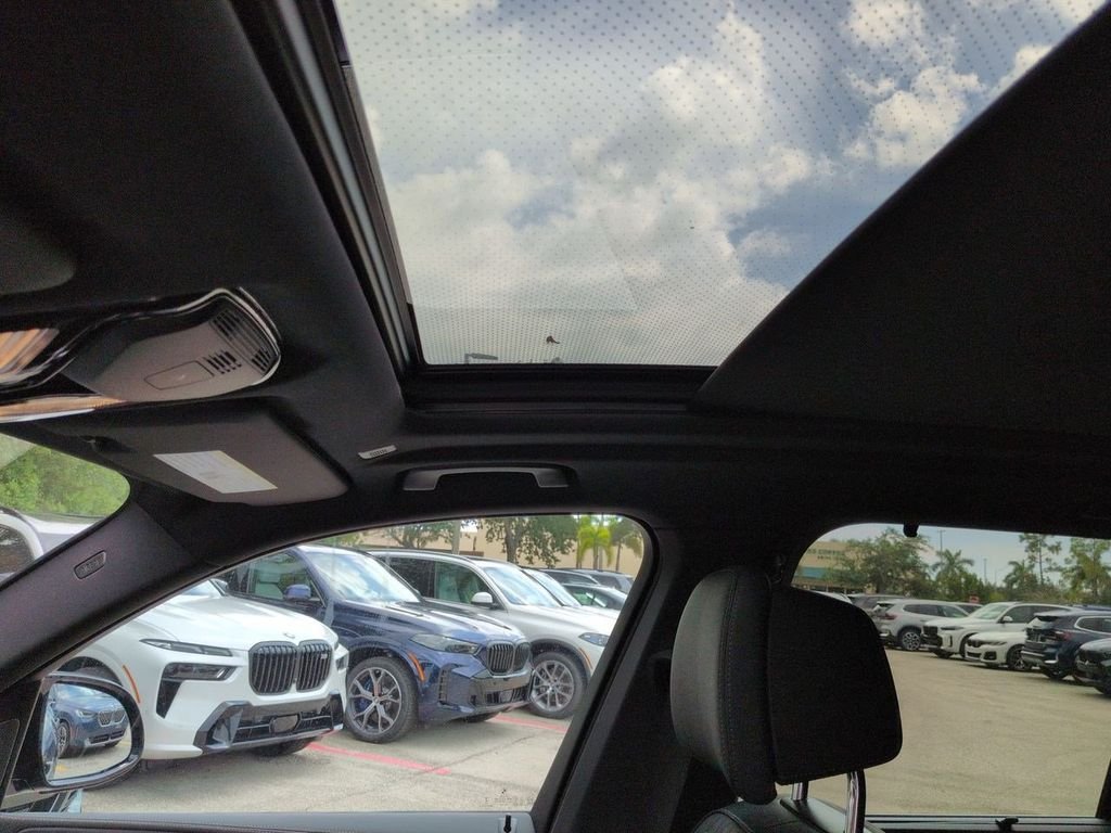 New 2026 Black Sapphire Metallic BMW M60i image 20