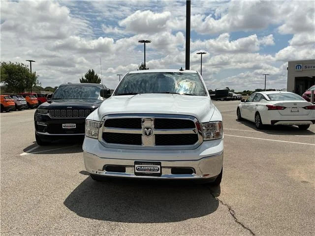 Used 2023 Bright White Clearcoat RAM SLT 4x4 Crew Cab 5.6 ft. box 140 in. WB image 2