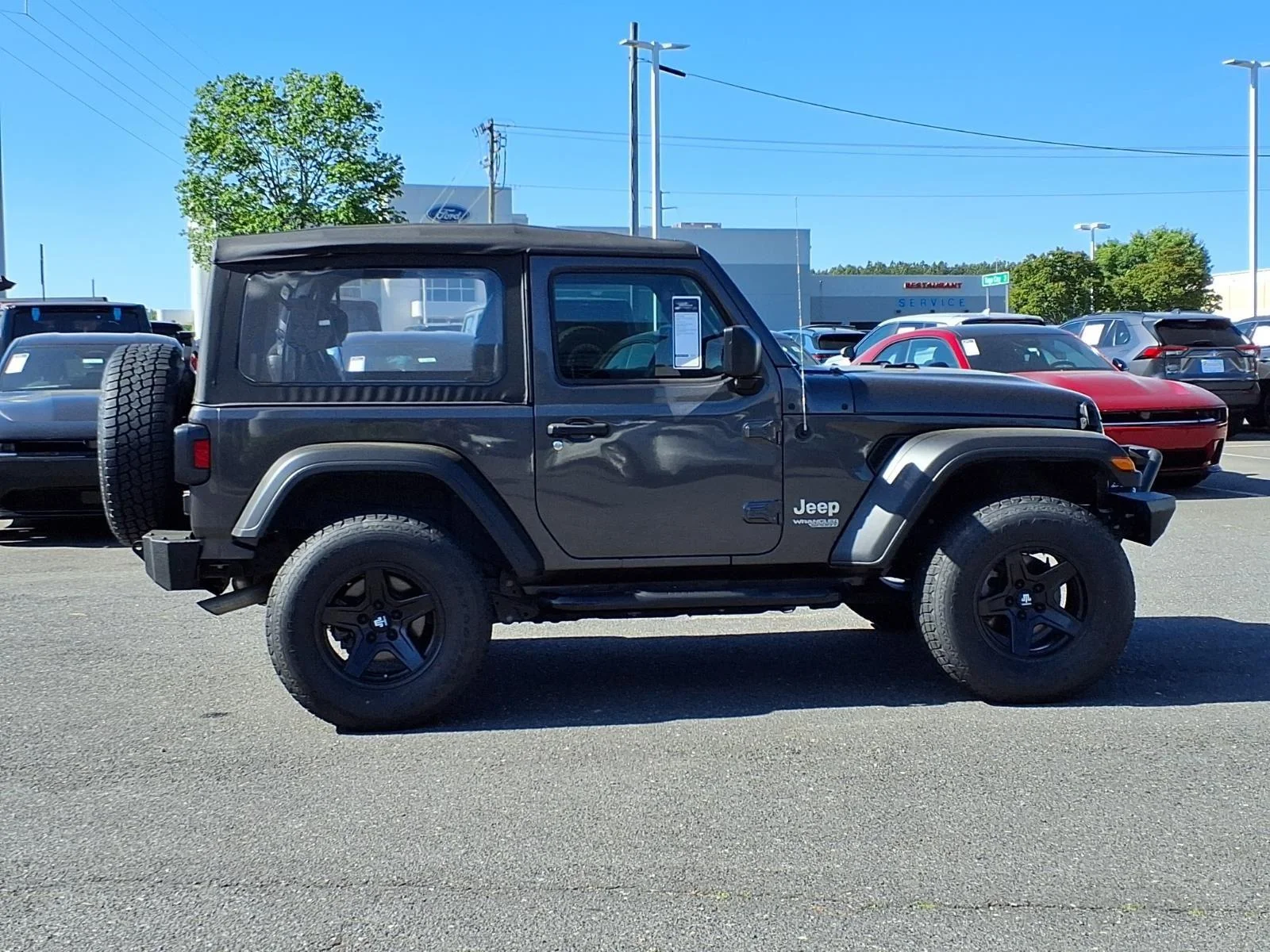 Used 2020 Granite Crystal Metallic Clearcoat Jeep Sport image 9