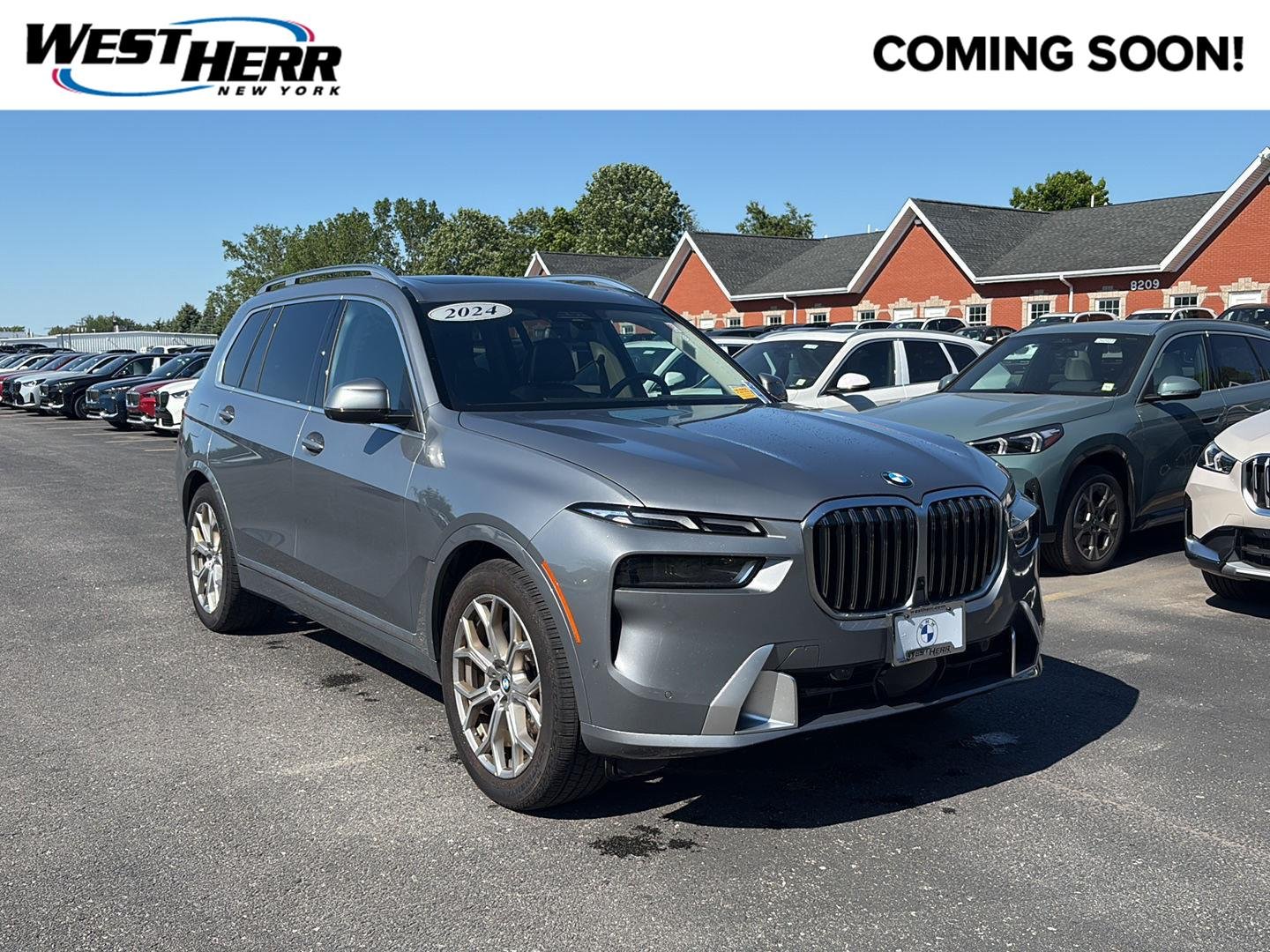 Used 2024 Skyscraper Grey Metallic BMW xDrive40i image 1