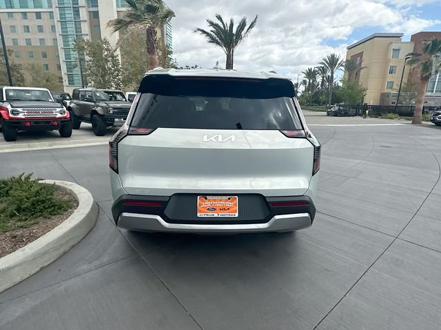 New 2026 Ivory Silver Kia Wind AWD image 6