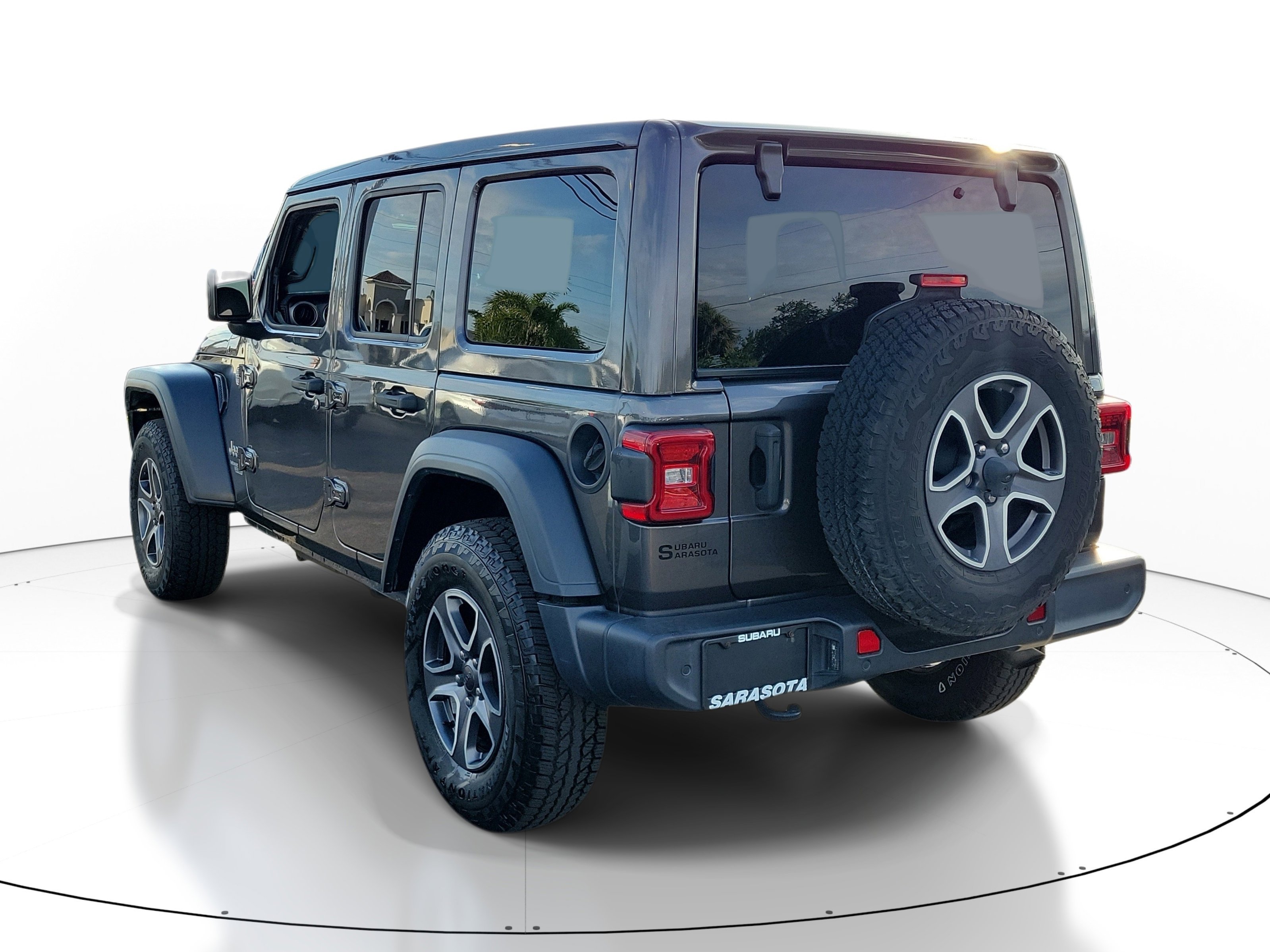Used 2020 Granite Crystal Metallic Clearcoat Jeep Sport S image 4