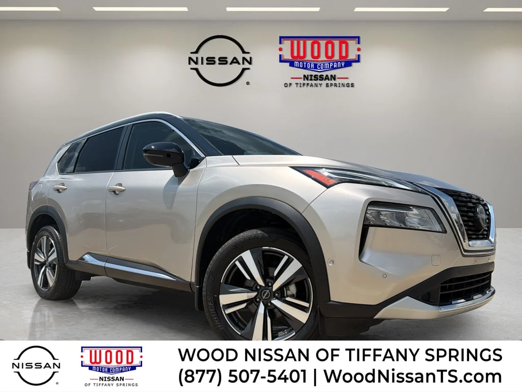 Used 2023 Champagne Silver Metallic Super Black Nissan Platinum image 1