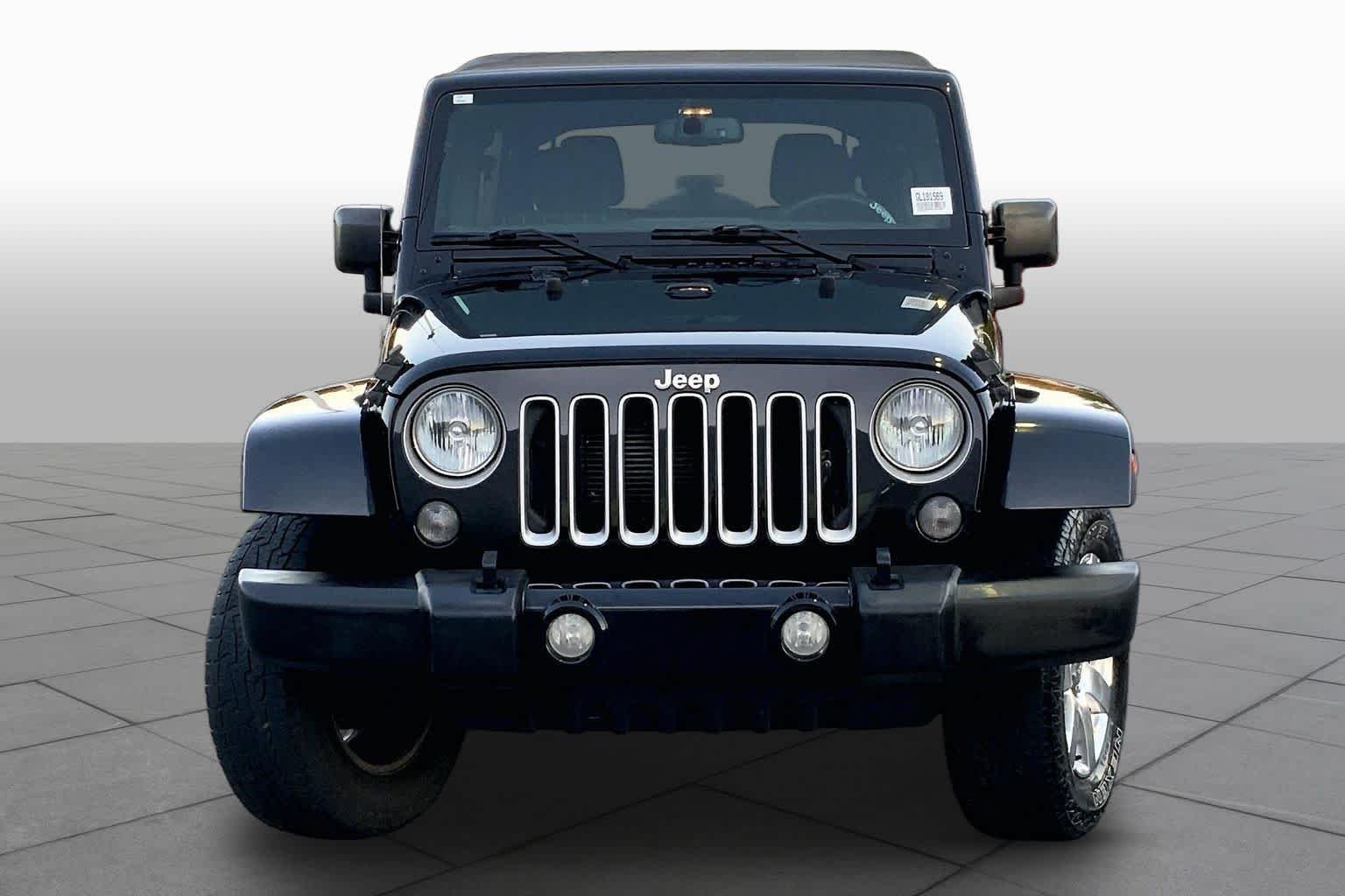 Used 2016 Black Clearcoat Jeep Sahara image 4