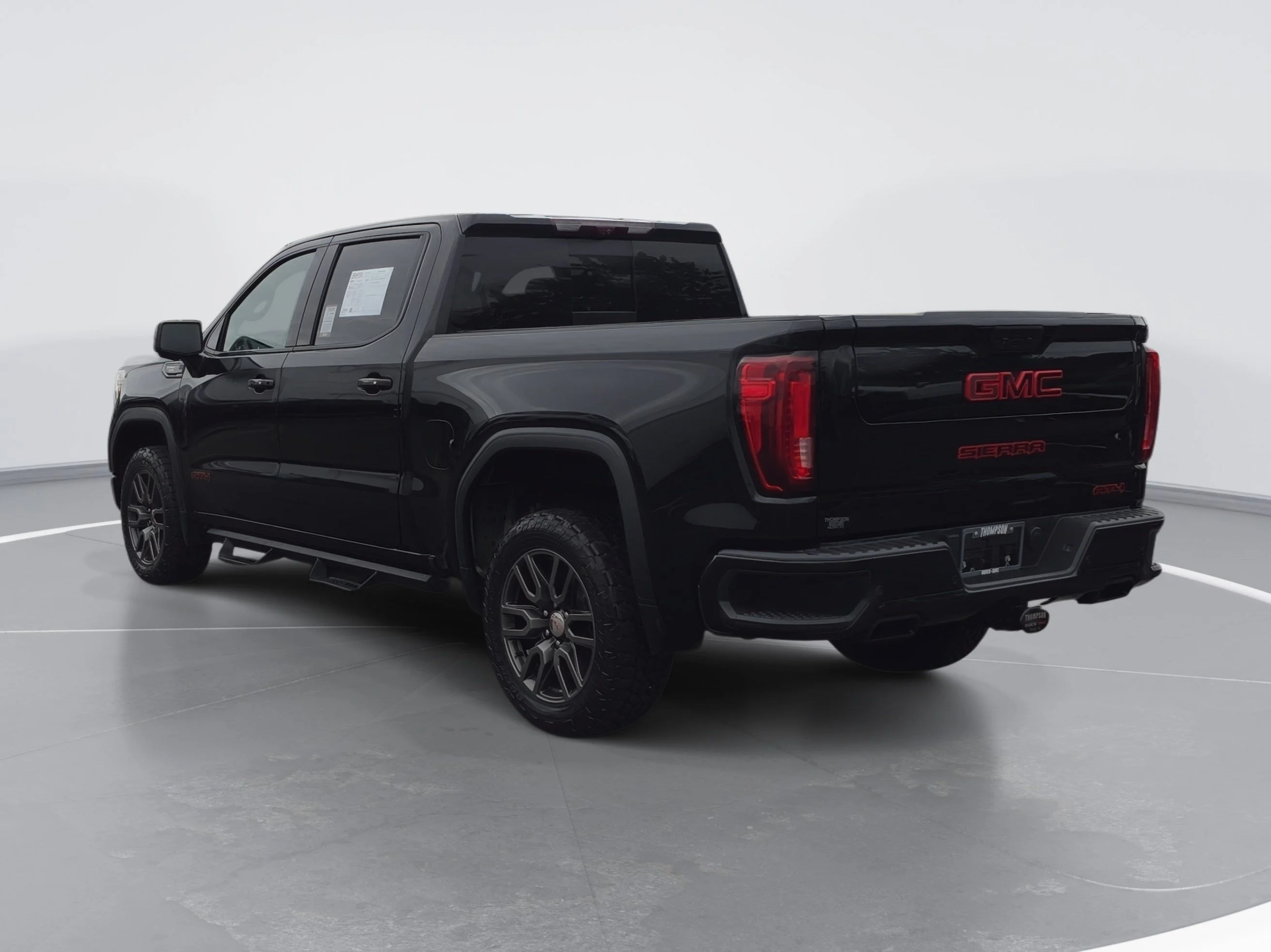 Used 2021 EBONY TWILIGHT METALLIC GMC AT4 image 5