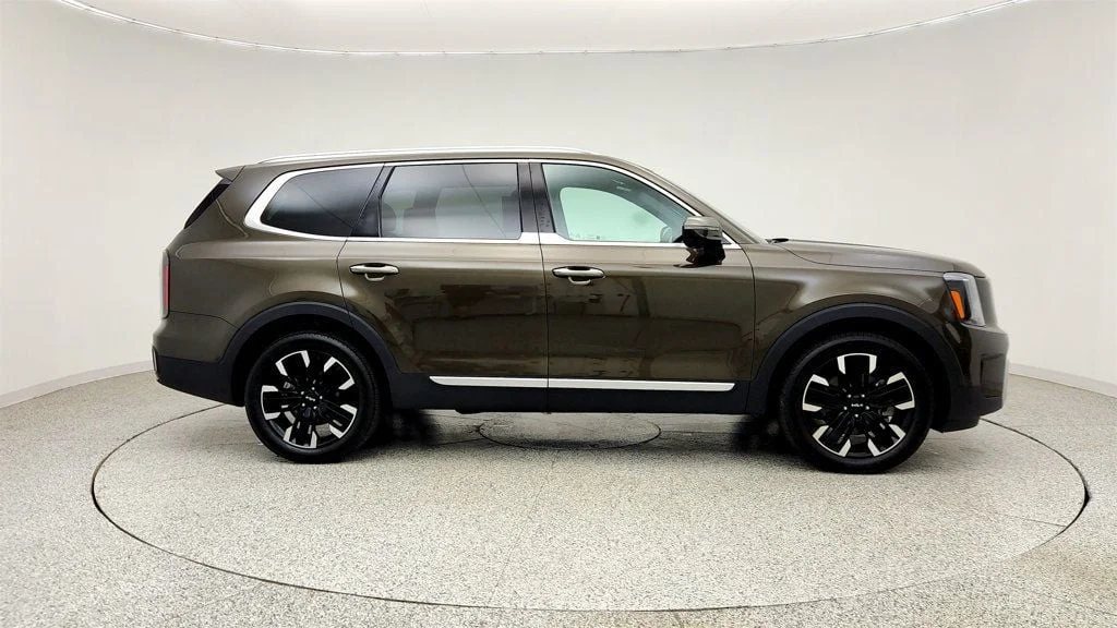 Used 2025 Dark Moss Kia SX AWD w/ Captain