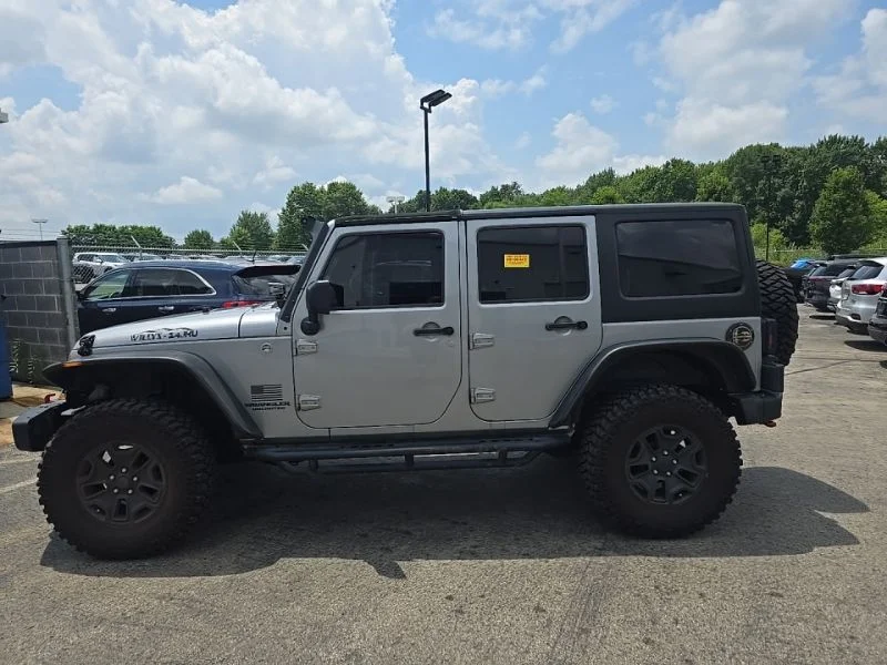 Used 2014 Gray Jeep Unlimited Sport image 4
