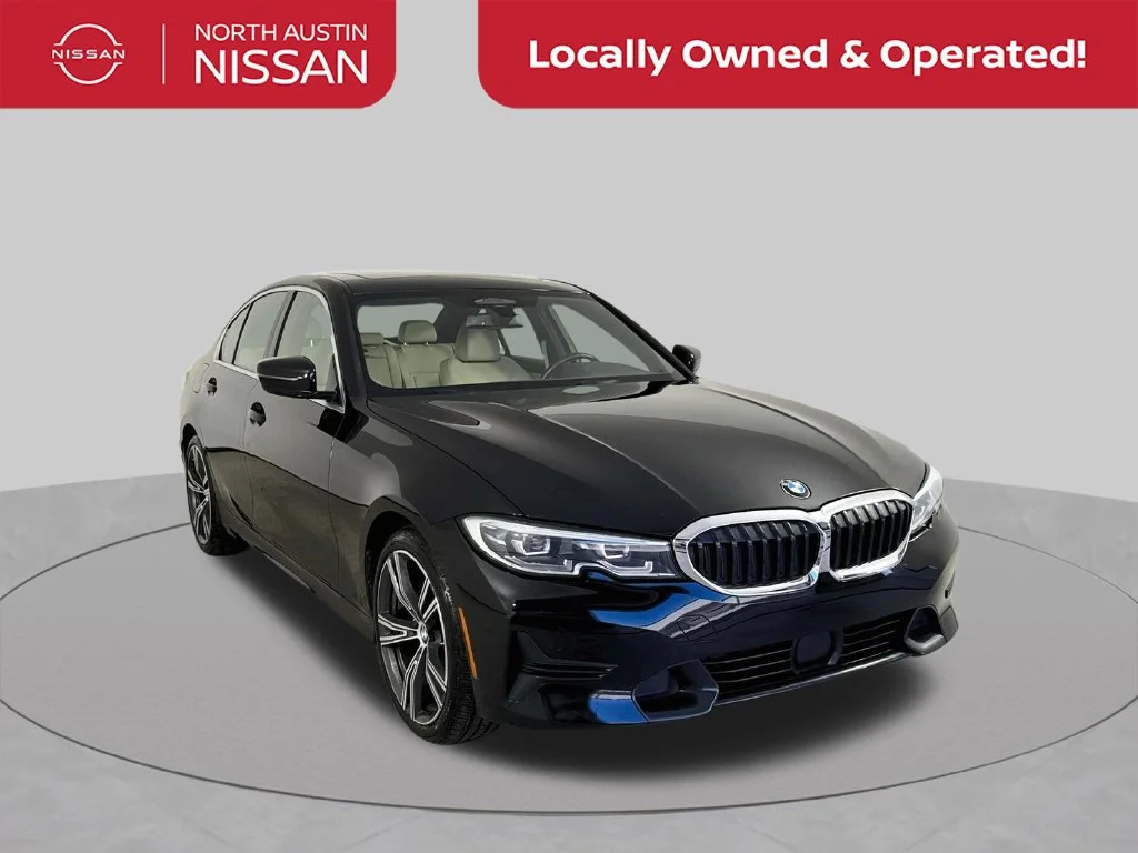Used 2021 Black BMW 330e xDrive image 1