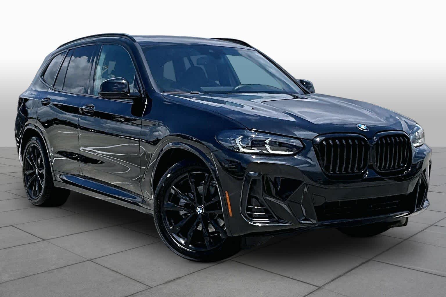 Used 2023 Black Sapphire Metallic BMW sDrive30i image 2