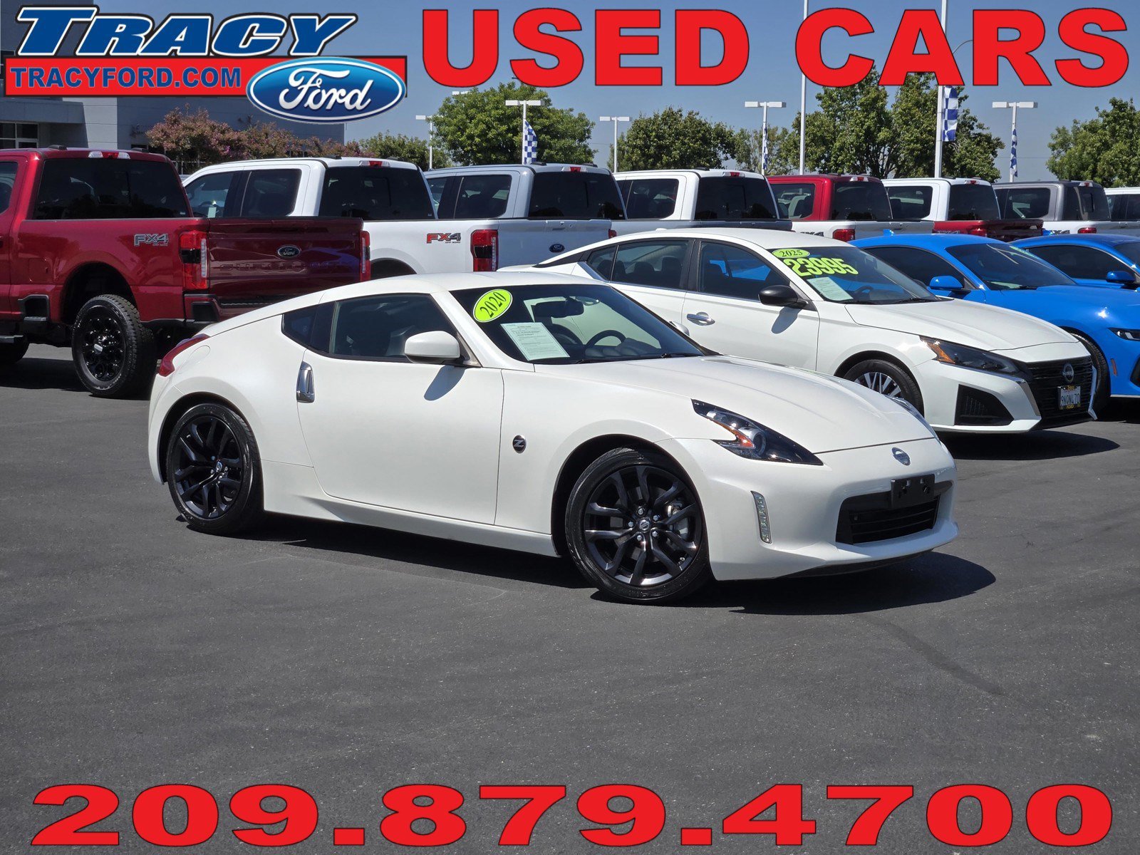 Used 2020 Pearl White Tricoat Nissan  image 1