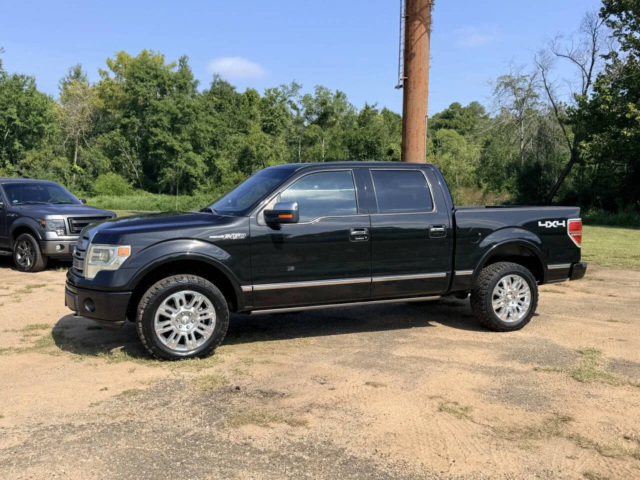 Used 2013 Black Ford Lariat 4x4 4dr SuperCrew Styleside 6.5 ft. SB image 1