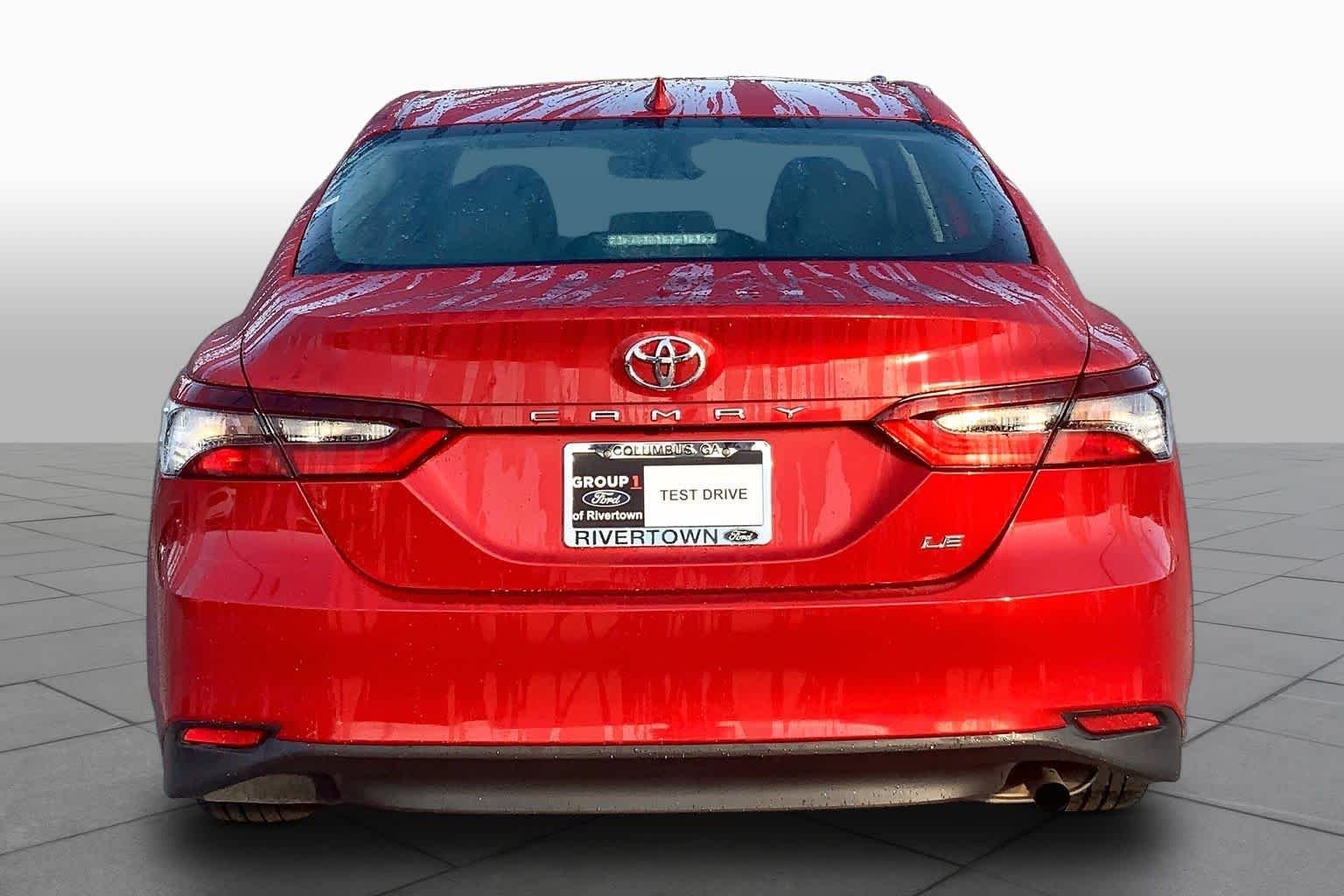 Used 2024 Supersonic Red Toyota LE image 5