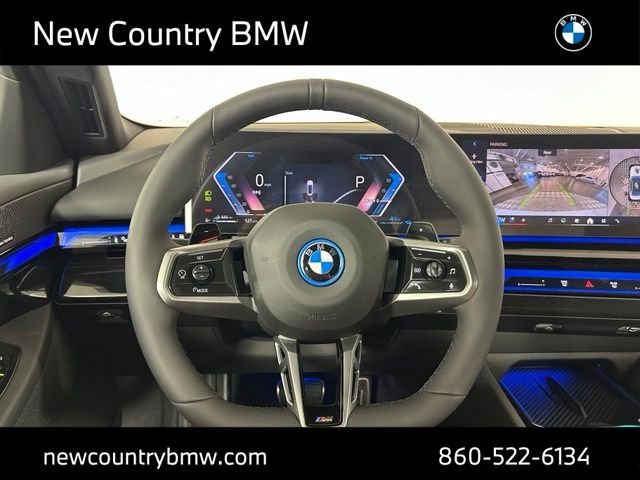 New 2026 Mineral White Metallic BMW 550e xDrive image 11