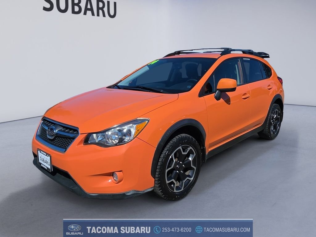 Used 2014 Orange Subaru 2.0i Limited image 1