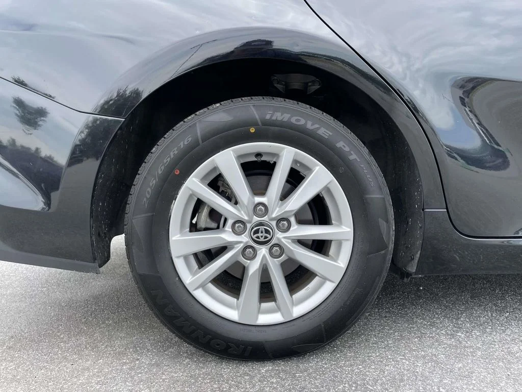 Used 2025 Midnight Black Metallic Toyota LE image 32