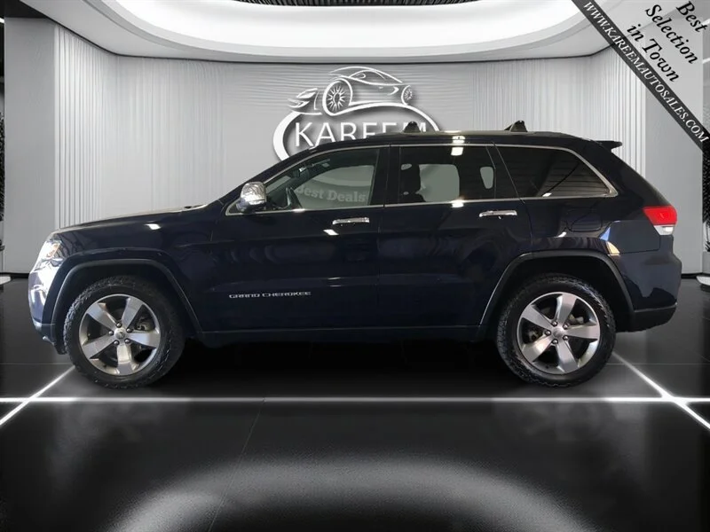 Used 2014 True Blue Pearlcoat Jeep Limited image 8