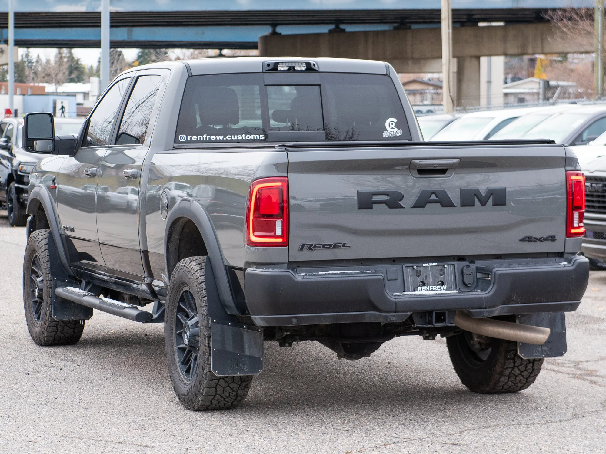 Used 2026 Grey RAM Rebel* Crew Cab 4x4, 2 Inch Lift, 35 Inch Tires, Winch, Trigger Industries MudFlaps image 4