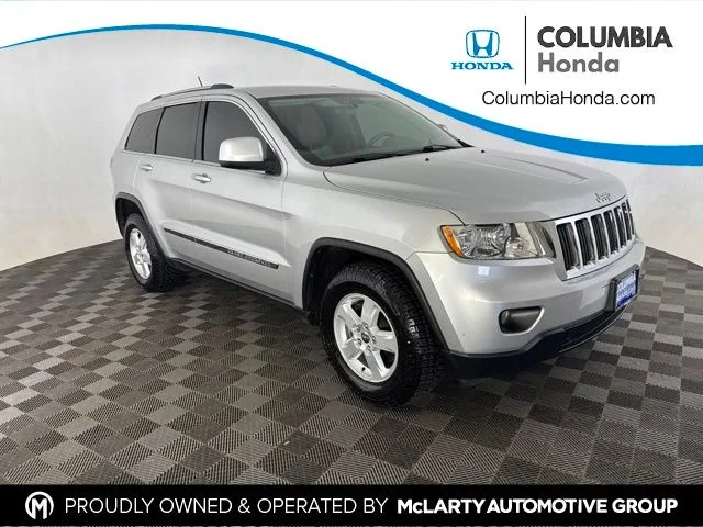 Used 2012 Silver Jeep Laredo image 1