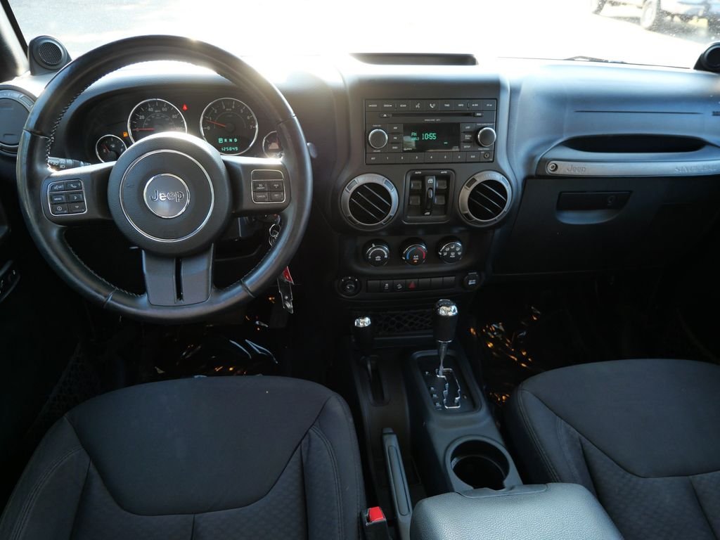 Used 2013 Black Jeep Unlimited Sport image 3
