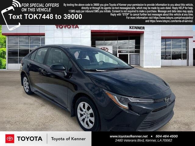 Used 2025 Midnight Black Metallic Toyota LE image 1