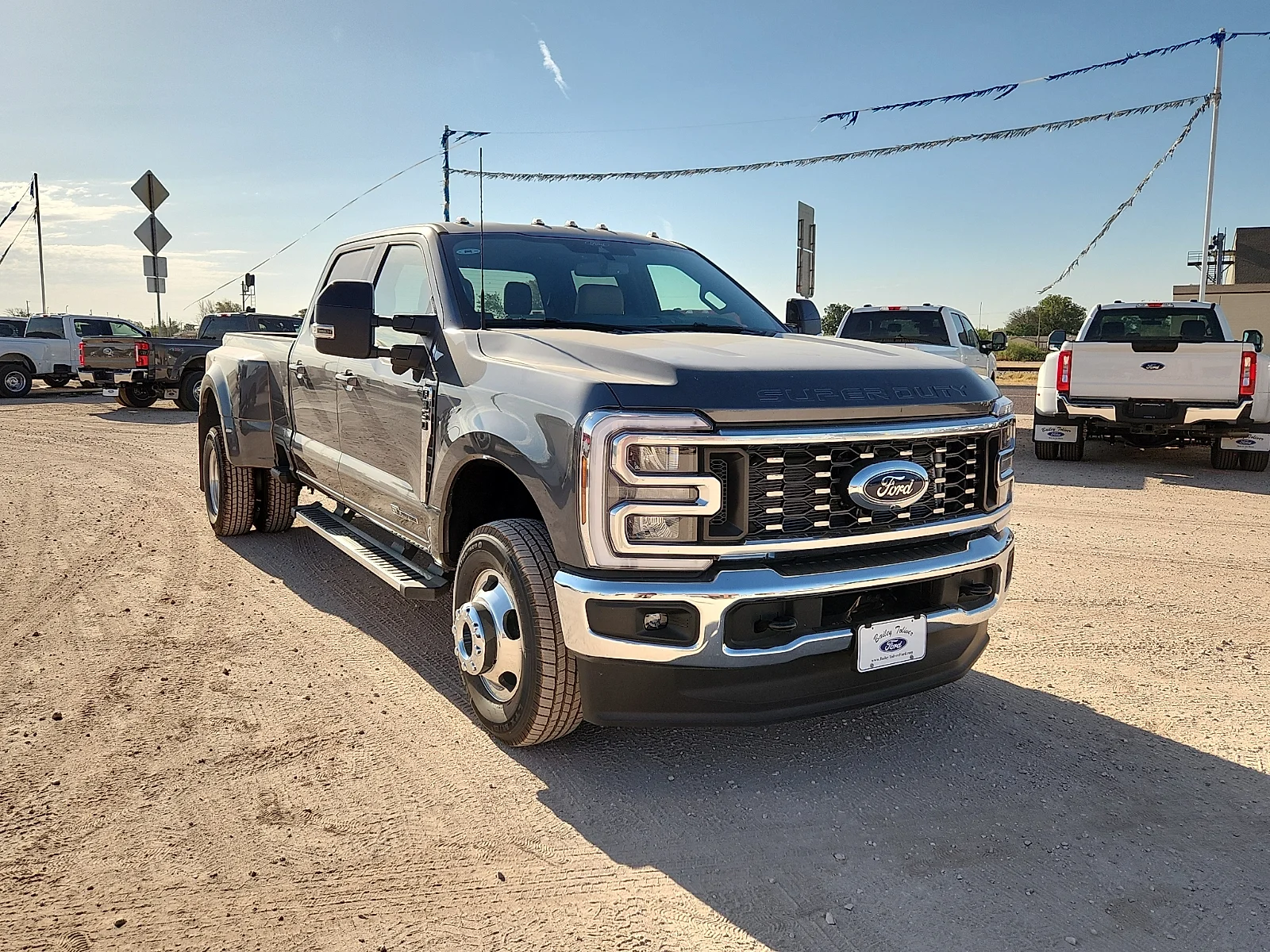 New 2026 Carbonized Gray Metallic Ford Lariat image 1
