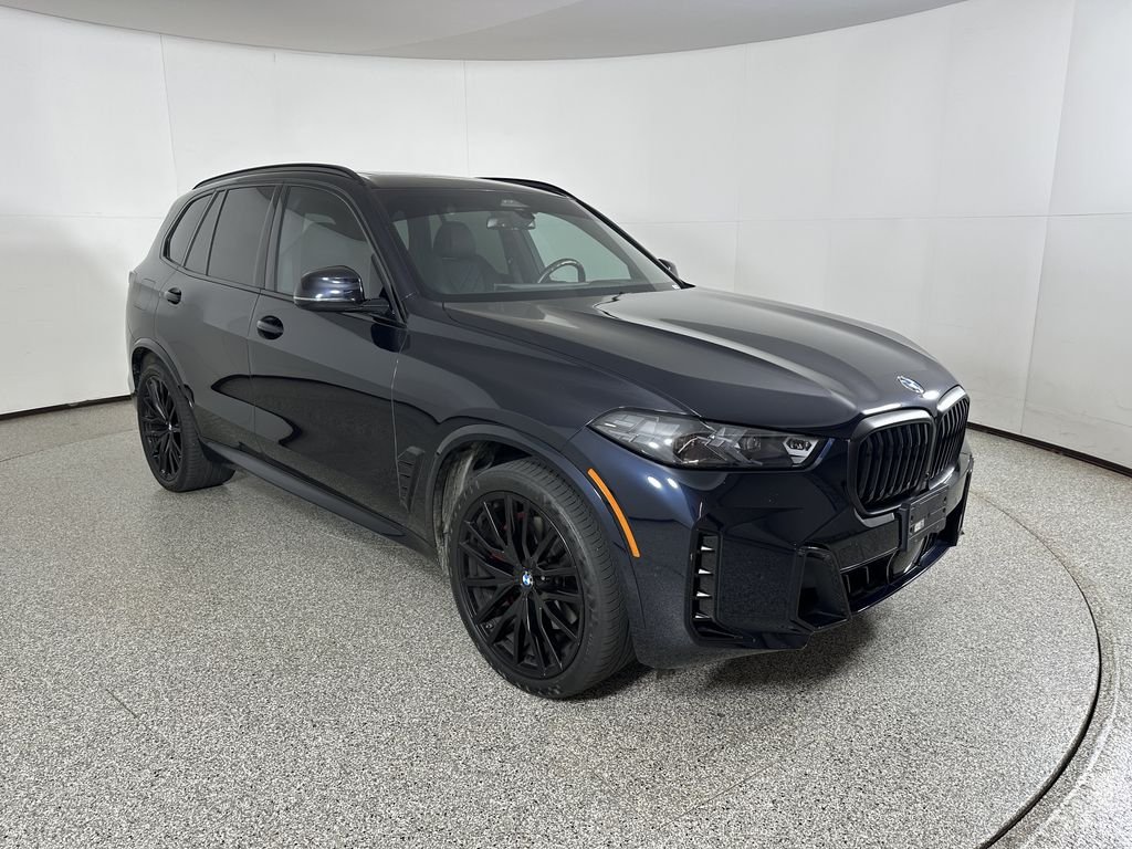 Certified Used 2024 Carbon Black Metallic BMW xDrive40i image 4