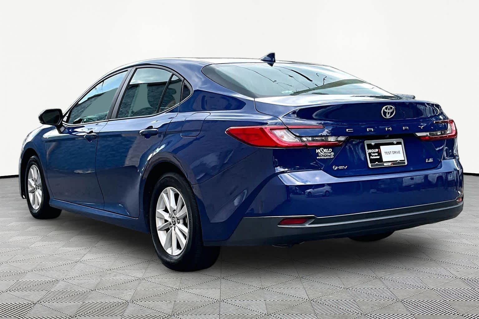 Used 2025 Reservoir Blue Toyota LE image 12