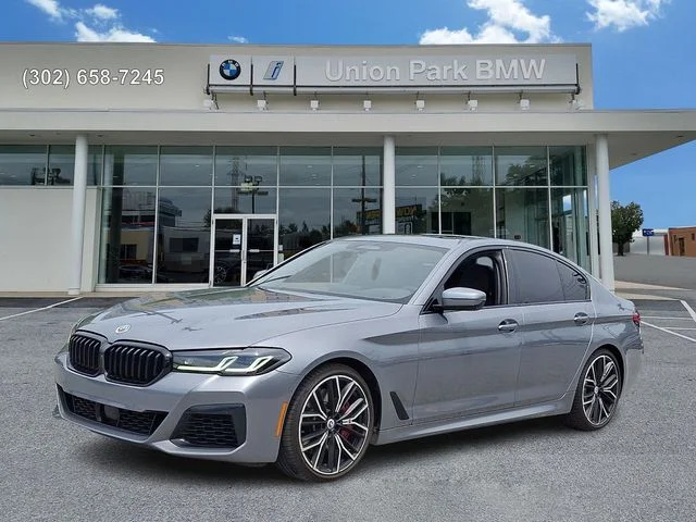 Used 2023 Skyscraper Grey Metallic BMW M550i xDrive image 1