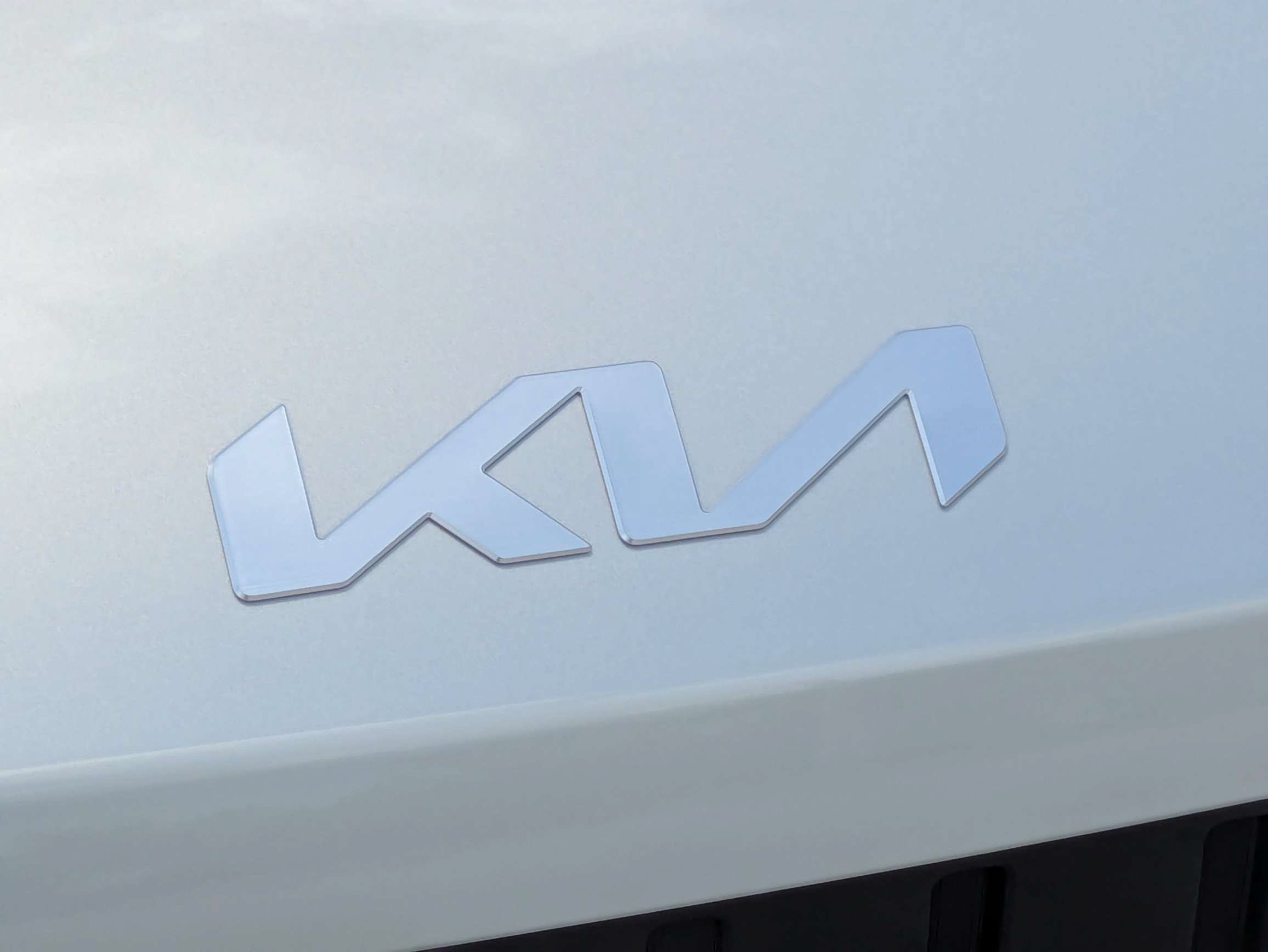 New 2027 Ivory Silver Kia LX image 13