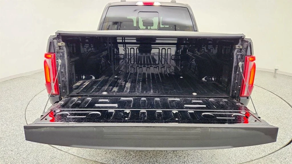 Used 2025 Agate Black Metallic Ford LARIAT 4WD SuperCrew 5.5