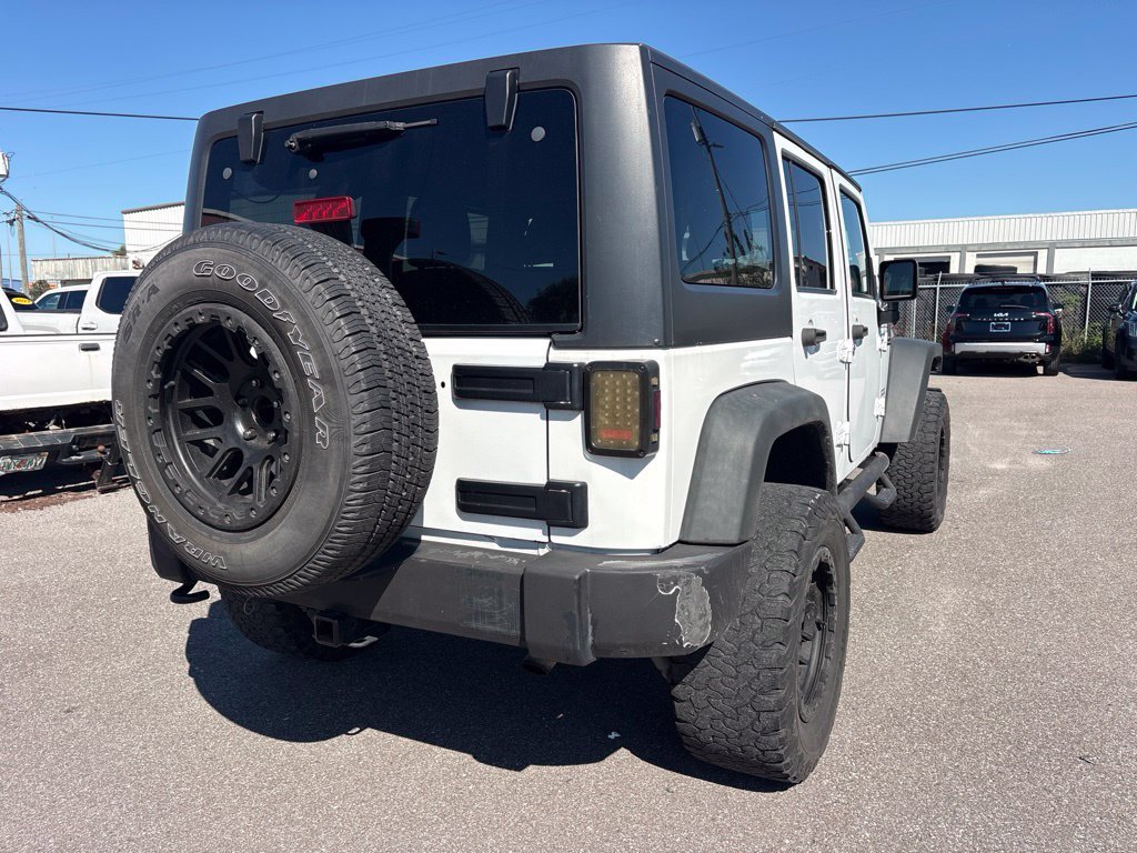 Used 2016 White Jeep Unlimited Sport image 3
