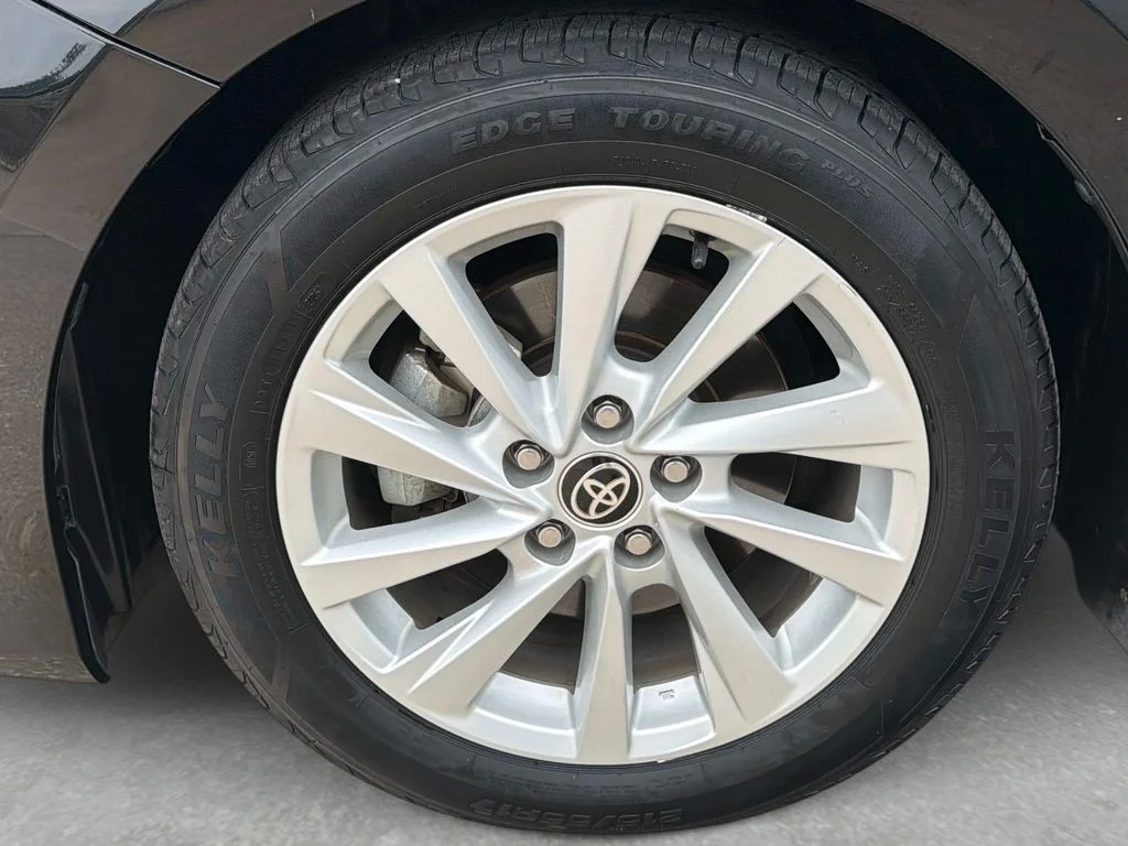 Used 2021 Midnight Black Metallic Toyota LE image 12