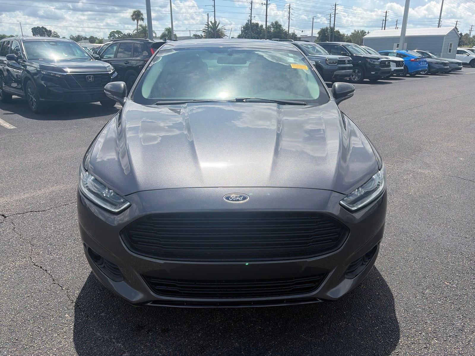 Used 2016 Ford Fusion SE with VIN 3FA6P0H73GR201916 for sale in Port Richey, FL