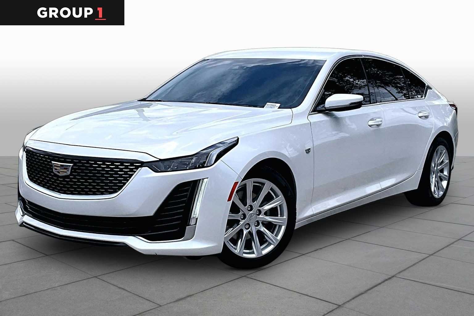Used 2023 CRYSTAL WHITE TRICOAT Cadillac Luxury image 1
