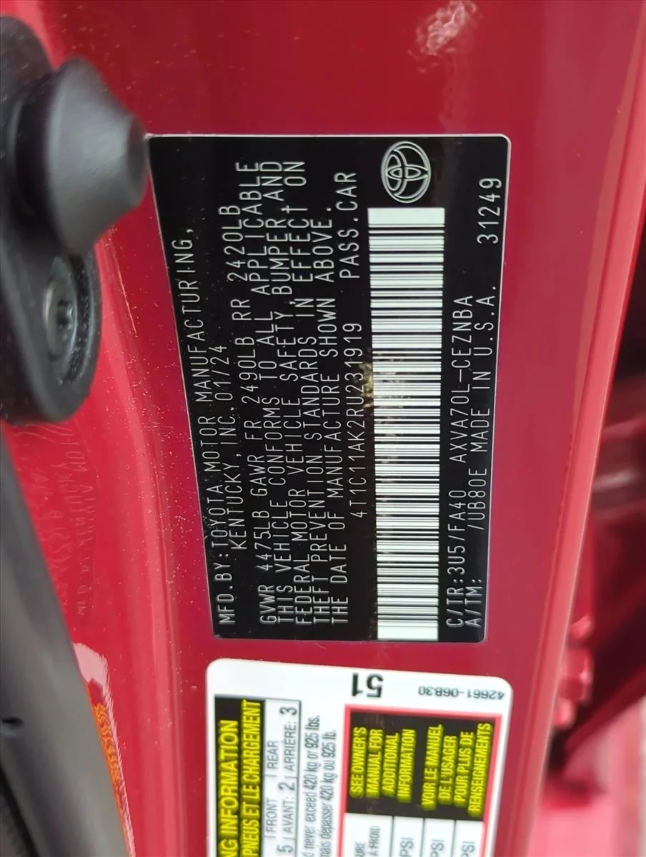 Used 2024 Supersonic Red Toyota LE image 2