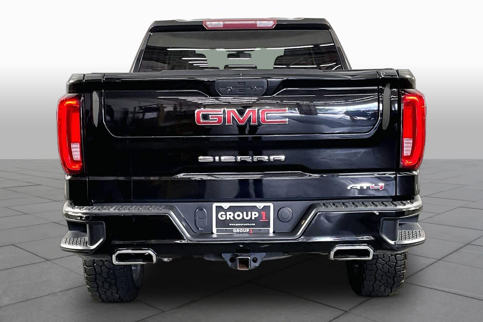 Used 2021 EBONY TWILIGHT METALLIC GMC AT4 image 5