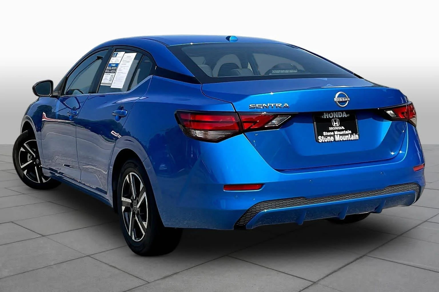 Used 2025 Electric Blue Metallic Nissan SV image 12