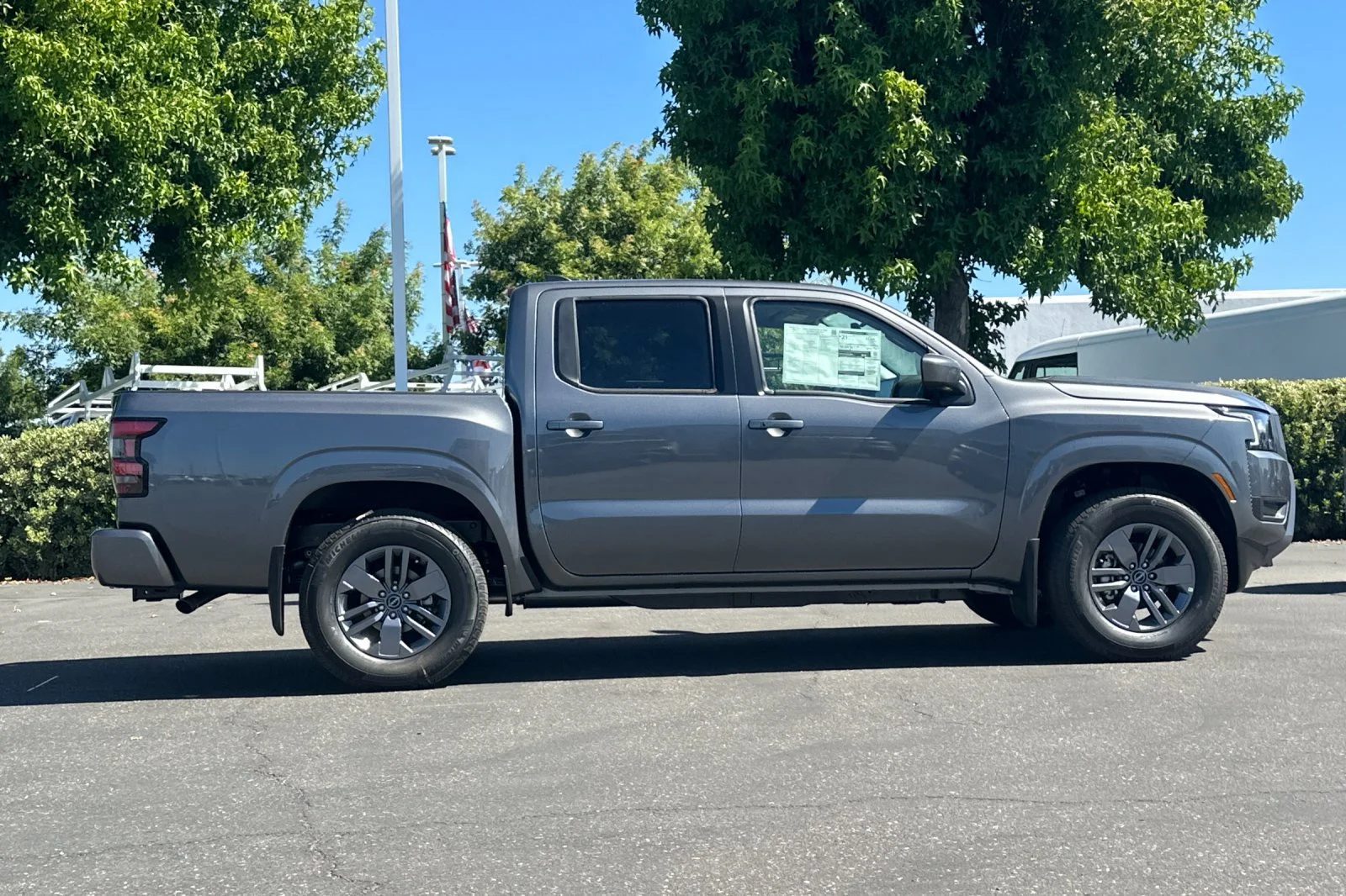 New 2026 Gun Metallic Nissan Crew Cab SV image 3