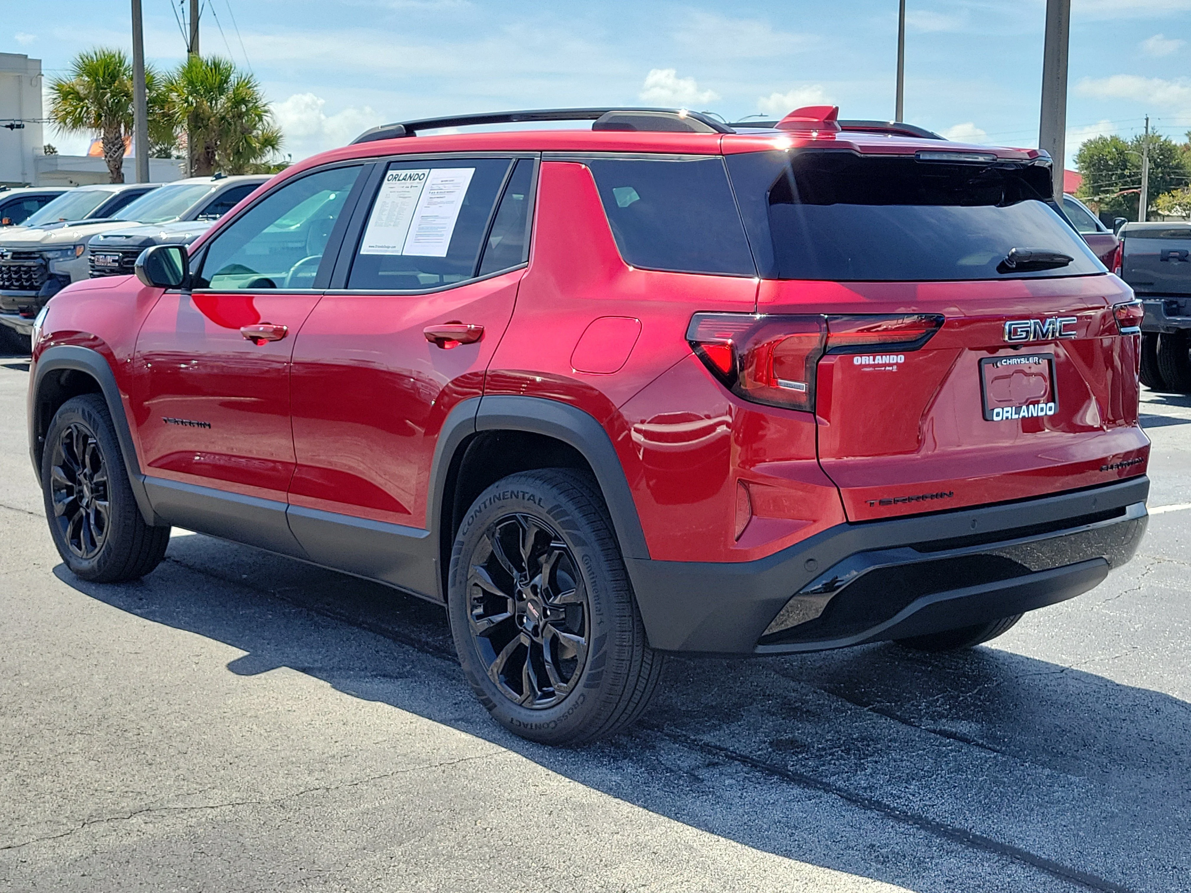 Used 2026 Volcanic Red Tintcoat GMC FWD Elevation image 5