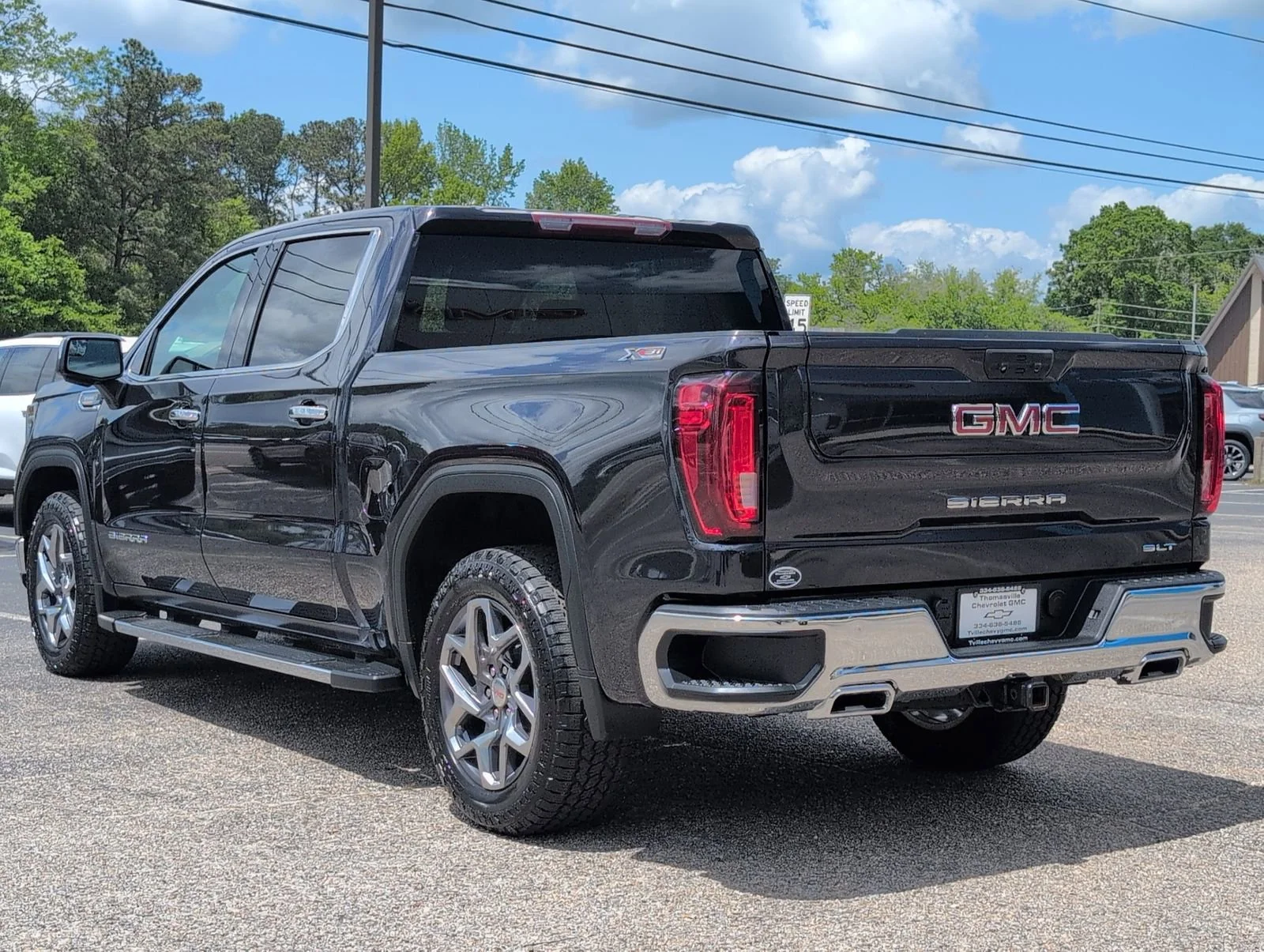 Used 2023 Titanium Rush Metallic GMC SLT image 3