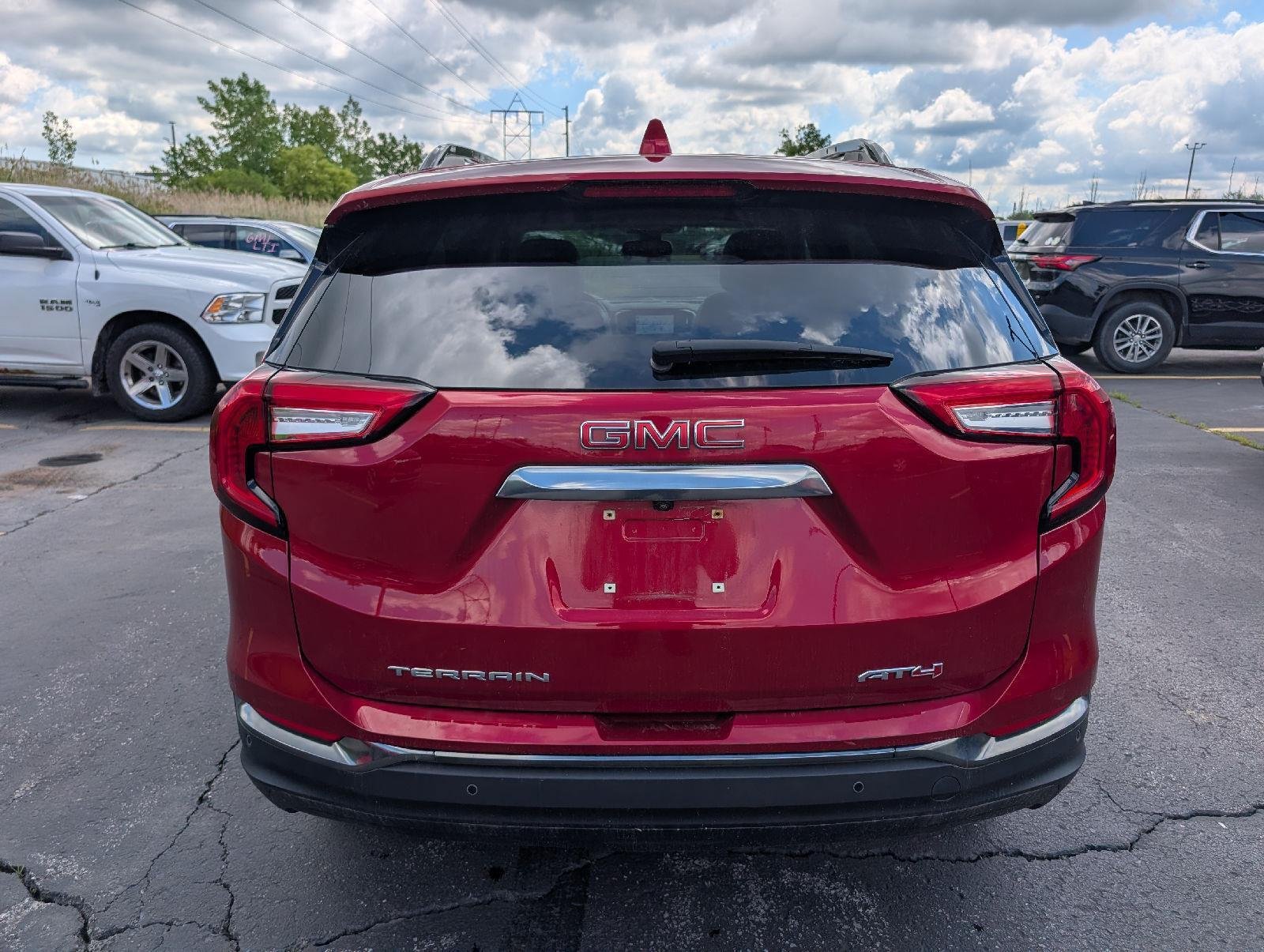 Used 2024 Volcanic Red Tintcoat GMC AT4 image 6