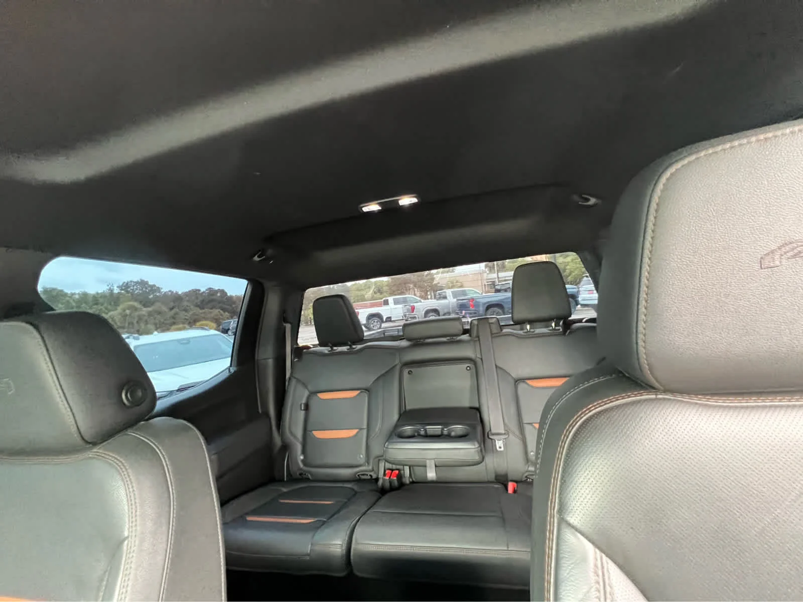Used 2021 EBONY TWILIGHT METALLIC GMC AT4 image 9