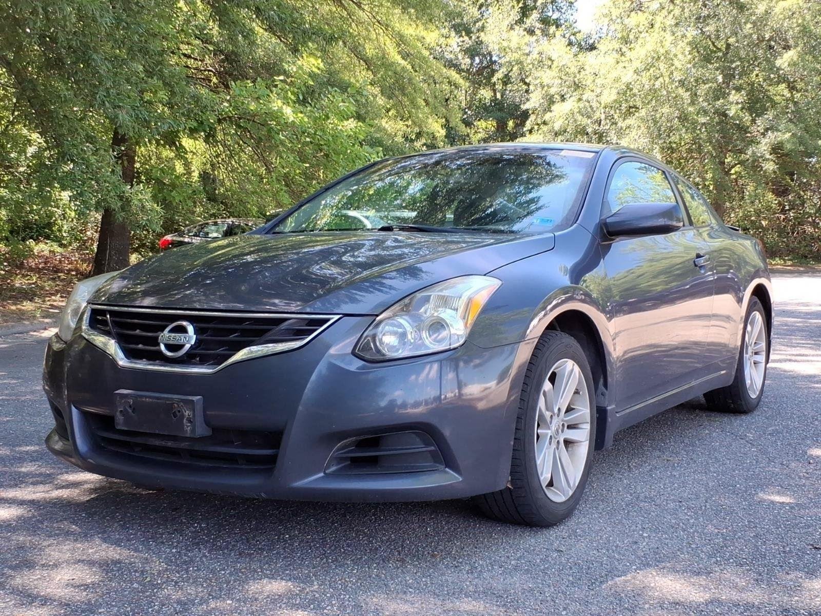 Used 2012 Navy Blue Metallic Nissan 2.5 S image 1