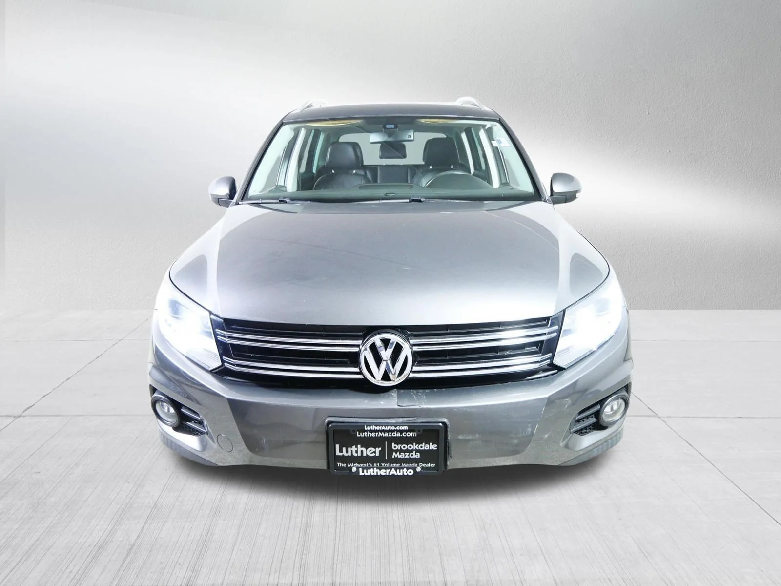 Used 2013 Volkswagen Tiguan SEL with VIN WVGBV7AX7DW006214 for sale in Minneapolis, MN