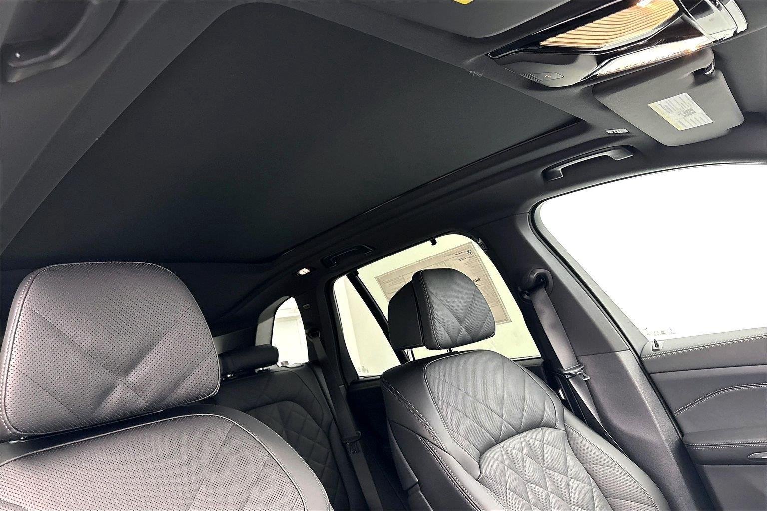 New 2026 Black Sapphire Metallic BMW xDrive50e image 35