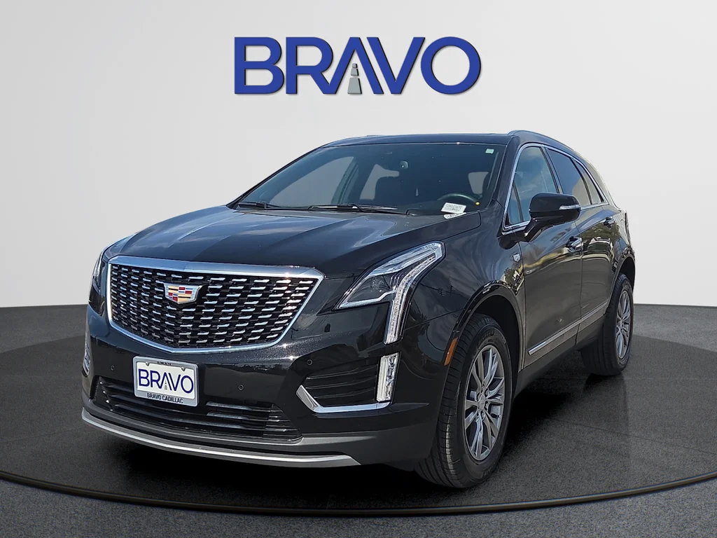 Used 2023 STELLAR BLACK METALLIC Cadillac FWD Premium Luxury image 1